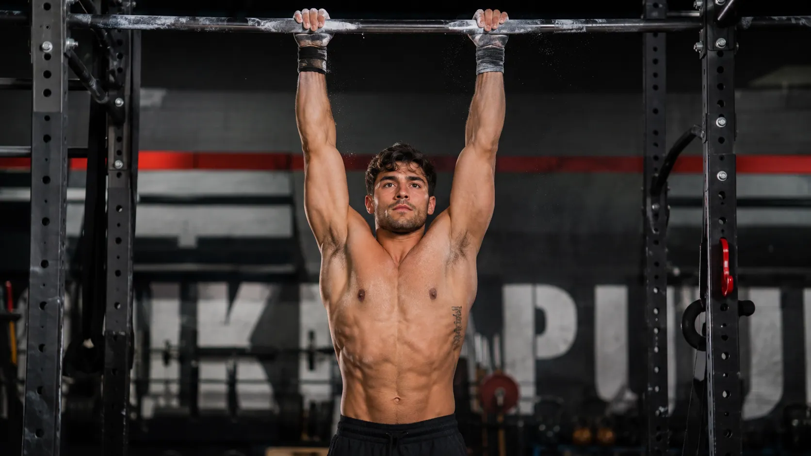 Grip strength training with a dead hang from a pull-up bar